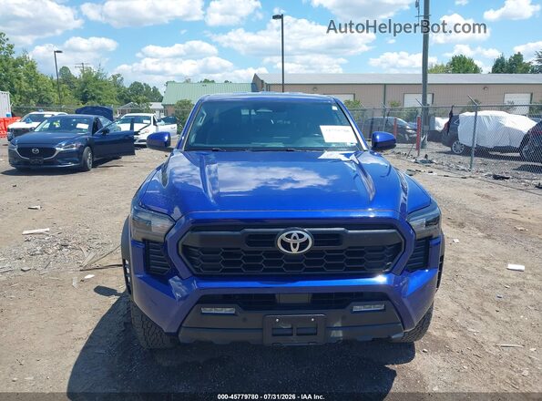 3TMLB5JN9RM026430 2024 TOYOTA TACOMA Blue Սալոնի հետևի տեսք