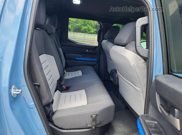 3TMLB5JN9TM214811 2026 TOYOTA TACOMA Blue Rear seats view