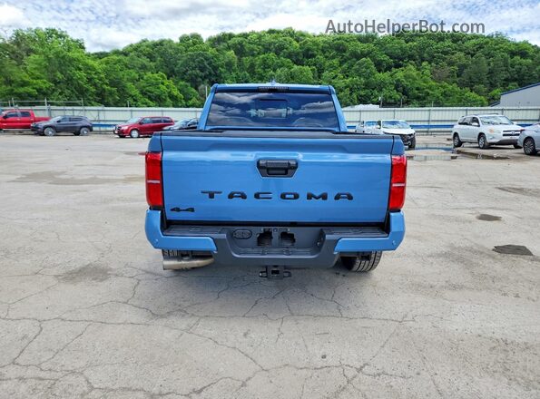 3TMLB5JN9TM214811 2026 TOYOTA TACOMA Blue Rear view