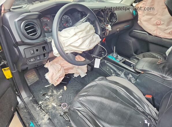 3TYAX5GN7PT082111 2023 TOYOTA TACOMA Black Առջևի վահանակի տեսք
