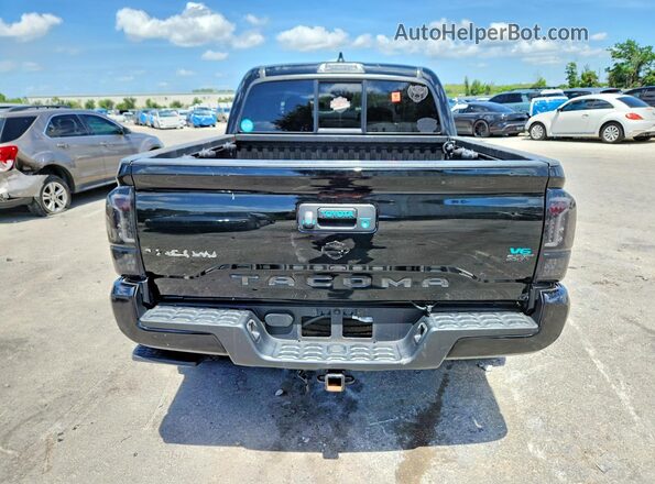 3TYAX5GN7PT082111 2023 TOYOTA TACOMA Black Հետևի տեսք