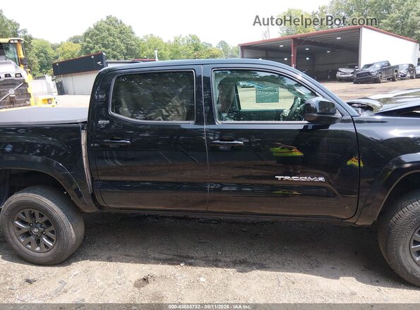 3TYAX5GN8PT075278 2023 TOYOTA TACOMA Black Սալոնի հետևի տեսք