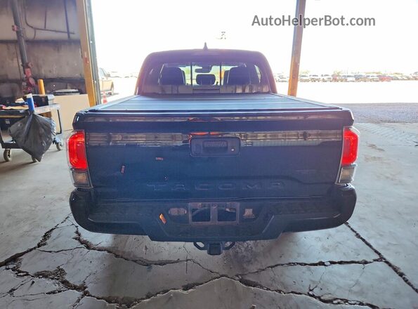 3TYCZ5AN1PT118385 2023 TOYOTA TACOMA Black Rear view