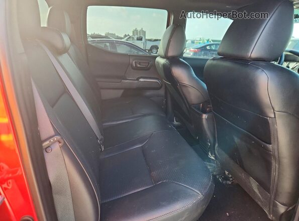 3TYCZ5AN1PT162192 2023 TOYOTA TACOMA Red Rear seats view