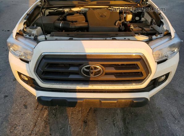 3TYCZ5AN3PT174022 2023 TOYOTA TACOMA White Սալոնի հետևի տեսք