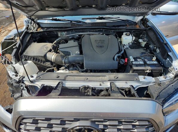 3TYCZ5AN6NT104561 2022 TOYOTA TACOMA Silver Vista interior trasera
