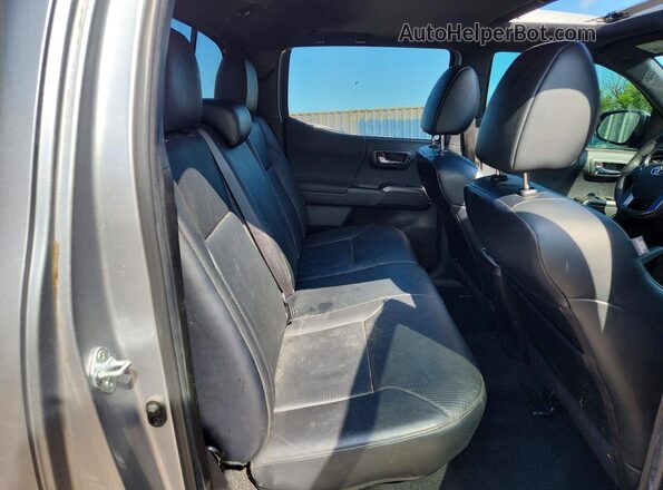 3TYCZ5AN6NT104561 2022 TOYOTA TACOMA Silver Vista de los asientos traseros