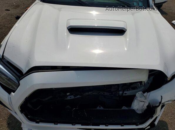 3TYCZ5AN7NT071067 2022 TOYOTA TACOMA White Սալոնի հետևի տեսք