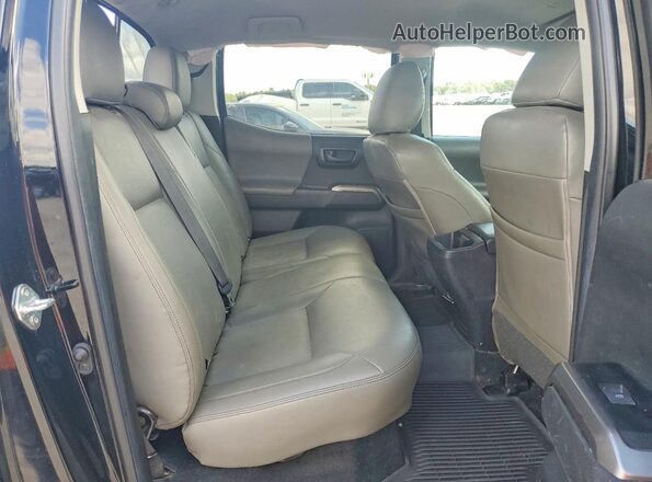 3TYCZ5AN7PT114308 2023 TOYOTA TACOMA Black Rear interior view
