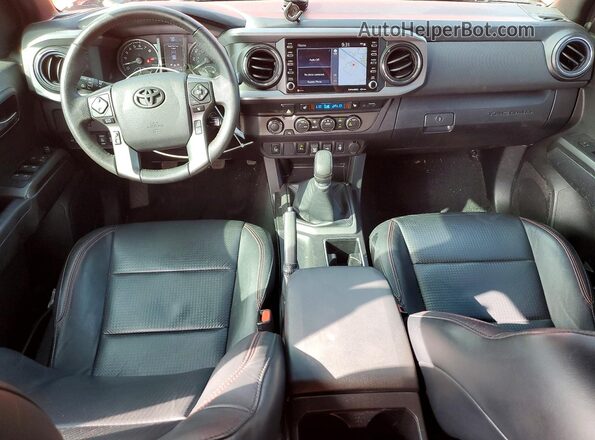 3TYCZ5AN7PT129388 2023 TOYOTA TACOMA Orange Widok deski rozdzielczej