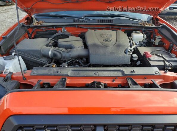 3TYCZ5AN7PT129388 2023 TOYOTA TACOMA Orange Widok wnętrza z tyłu