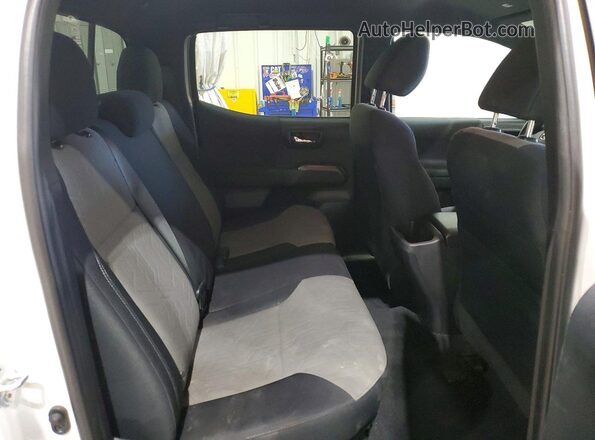 3TYCZ5AN9MT051207 2021 TOYOTA TACOMA White Vista de los asientos traseros