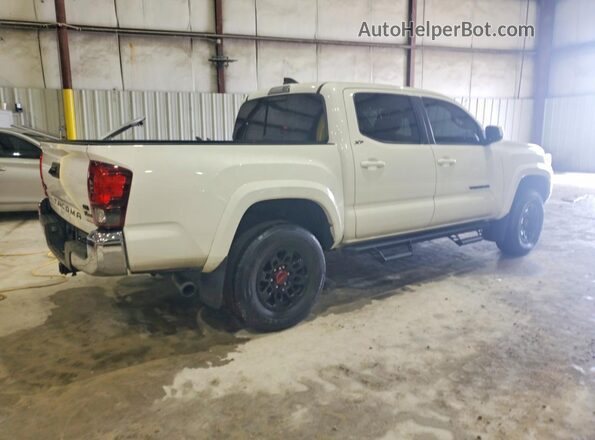 3TYCZ5AN9NT093684 2022 TOYOTA TACOMA White Trasero derecho