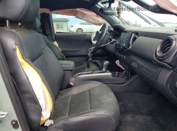 3TYDZ5BNXPT028204 2023 TOYOTA TACOMA Зеленый Вид салона спереди