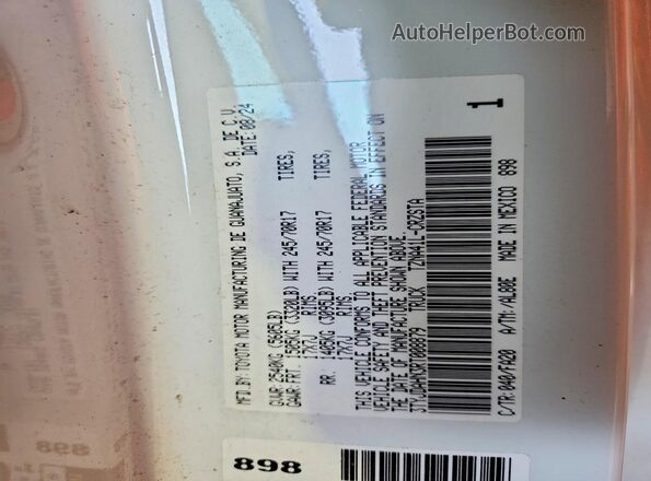 3TYJDAHN3RT008879 2024 TOYOTA TACOMA White Vista de la etiqueta del VIN