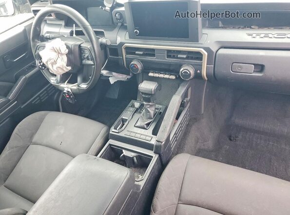 3TYJDAHN6RT011050 2024 TOYOTA TACOMA Белый Вид панели приборов
