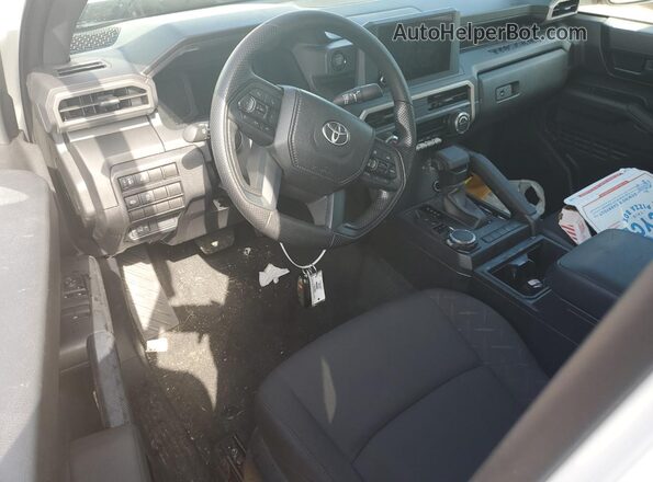 3TYJDAKN7RT005556 2024 TOYOTA TACOMA Белый Вид панели приборов
