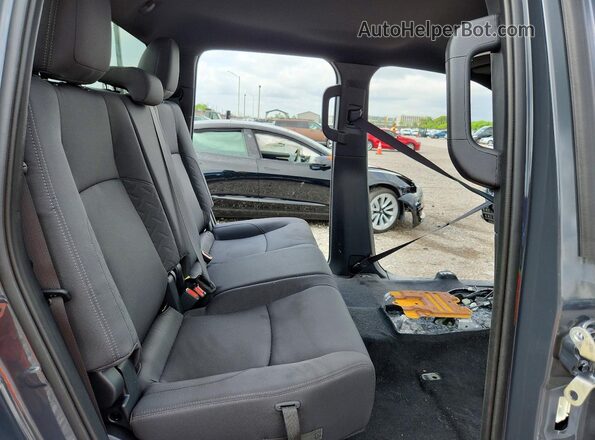 3TYKD5HN1ST030980 2025 TOYOTA TACOMA Black Vista de los asientos traseros