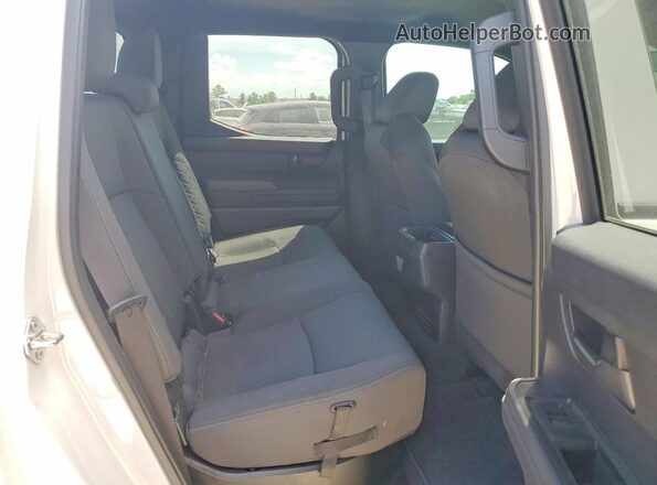 3TYKD5HN2ST021429 2025 TOYOTA TACOMA White Widok wnętrza z tyłu