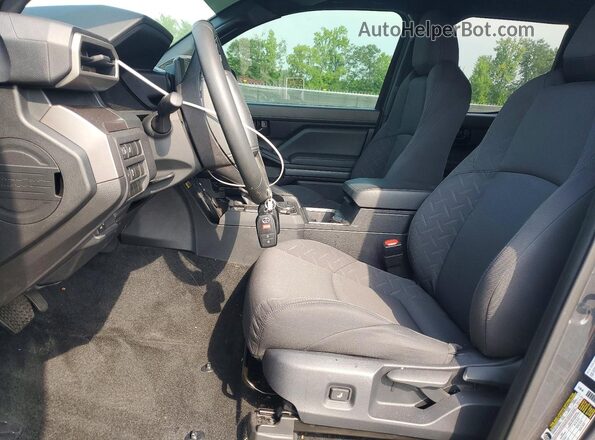 3TYLB5JN8ST063446 2025 TOYOTA TACOMA Charcoal Front interior view