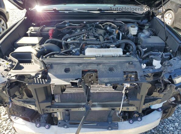 3TYLE5JN8RT049807 2024 TOYOTA TACOMA Black Սալոնի հետևի տեսք
