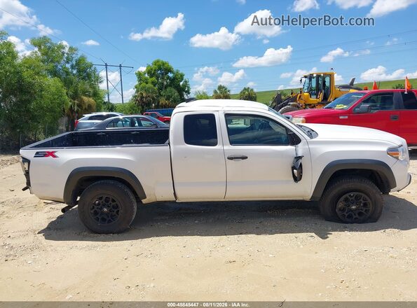 3TYRZ5CN5NT020593 2022 TOYOTA TACOMA White Սալոնի հետևի տեսք