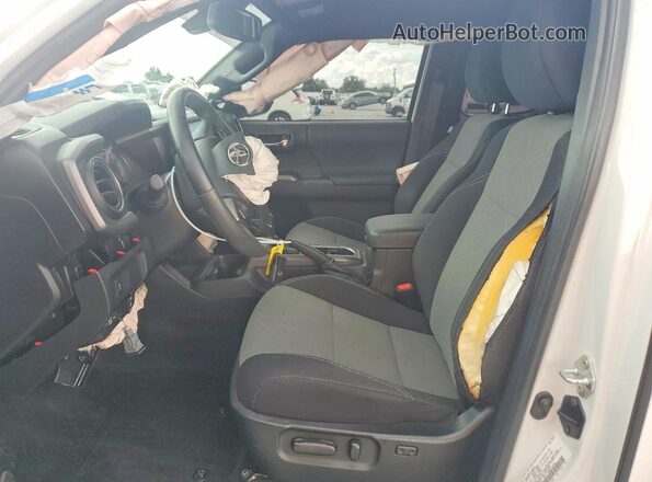3TYRZ5CN5NT020657 2022 TOYOTA TACOMA White წინა სალონის ხედი