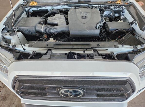 3TYSZ5AN1NT073960 2022 TOYOTA TACOMA White Սալոնի հետևի տեսք