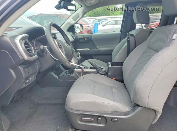 3TYSZ5AN3NT084765 2022 TOYOTA TACOMA Charcoal Front interior view