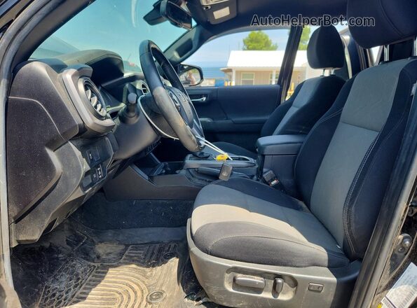 3TYSZ5AN8PT136779 2023 TOYOTA TACOMA Черный Вид салона спереди