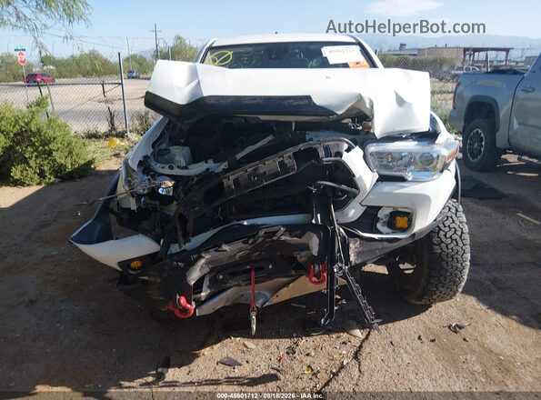 3TYSZ5AN9NT096192 2022 TOYOTA TACOMA Белый Вид панели приборов
