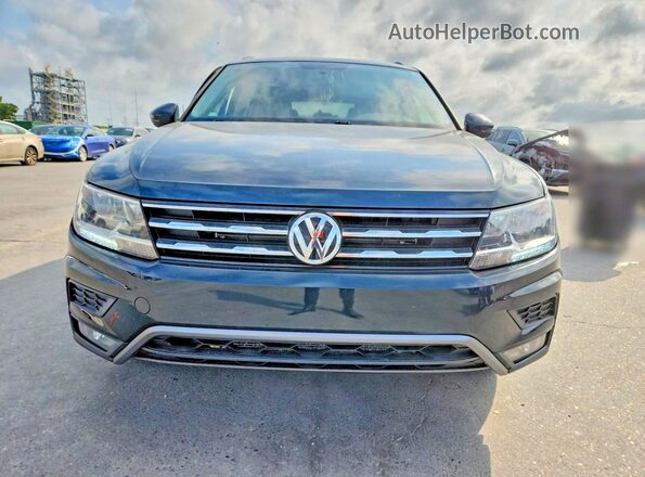 3VV0B7AX6JM018968 2018 VOLKSWAGEN TIGUAN Зеленый Вид спереди