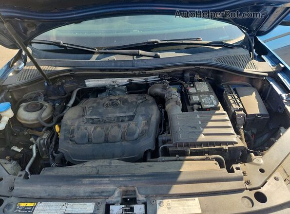 3VV0B7AX8JM193349 2018 VOLKSWAGEN TIGUAN Blue Vista interior trasera
