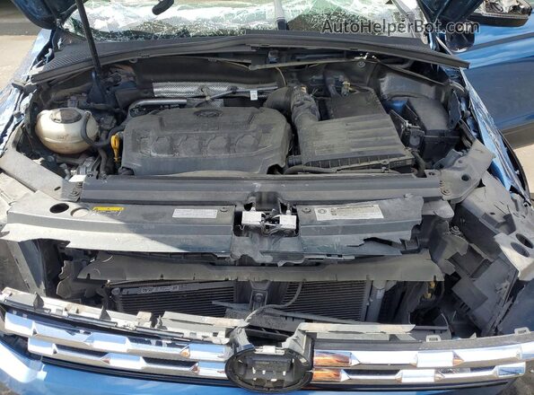 3VV1B7AX4LM056450 2020 VOLKSWAGEN TIGUAN Blue Vista interior trasera