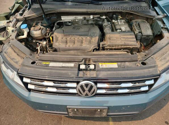 3VV2B7AX1MM127724 2021 VOLKSWAGEN TIGUAN Бирюзовый Вид задней части салона