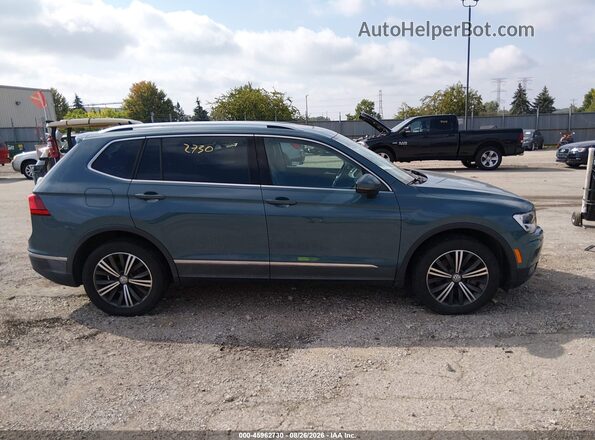 3VV2B7AX2KM094178 2019 VOLKSWAGEN TIGUAN Teal Rear interior view