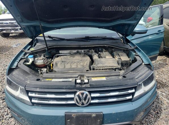 3VV2B7AX3MM062195 2021 VOLKSWAGEN TIGUAN Blue Vista interior trasera