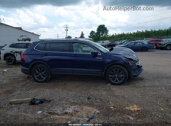 3VV2B7AX3NM066099 2022 VOLKSWAGEN TIGUAN Blue Vista interior trasera