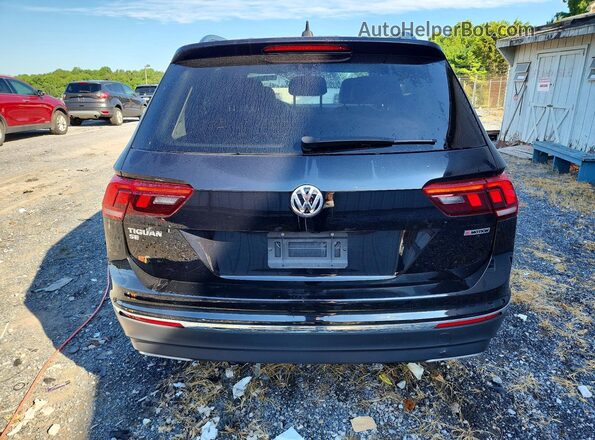 3VV2B7AX6LM010591 2020 VOLKSWAGEN TIGUAN Black Rear view