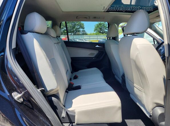 3VV2B7AX7LM033717 2020 VOLKSWAGEN TIGUAN Black Rear interior view