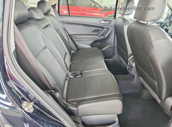 3VV2B7AX9JM100203 2018 VOLKSWAGEN TIGUAN Black Vista interior trasera