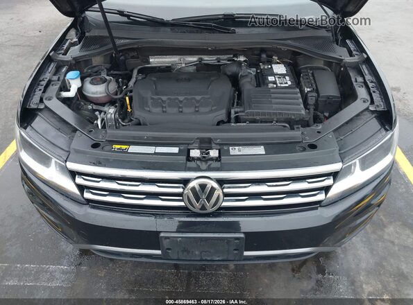3VV2B7AX9JM161454 2018 VOLKSWAGEN TIGUAN Black Rear view