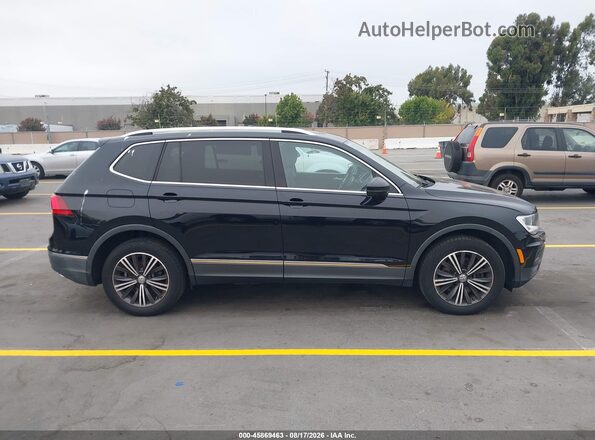 3VV2B7AX9JM161454 2018 VOLKSWAGEN TIGUAN Black Rear interior view