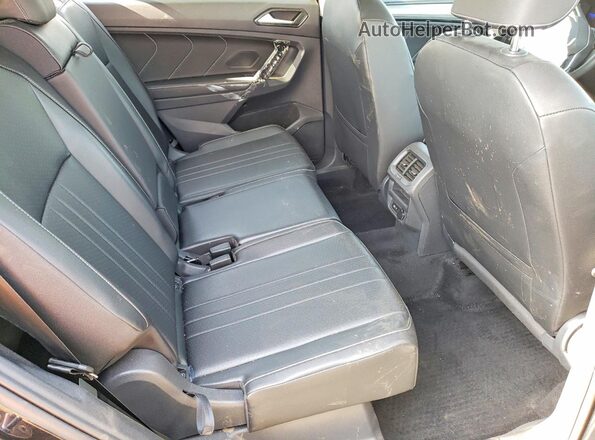 3VV3B7AX0NM052469 2022 VOLKSWAGEN TIGUAN Black Vista interior trasera