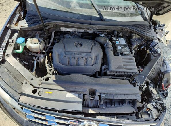 3VV3B7AX1JM027154 2018 VOLKSWAGEN TIGUAN Black Widok wnętrza z tyłu