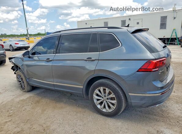 3VV3B7AX1JM090593 2018 VOLKSWAGEN TIGUAN Silver Trasero izquierdo