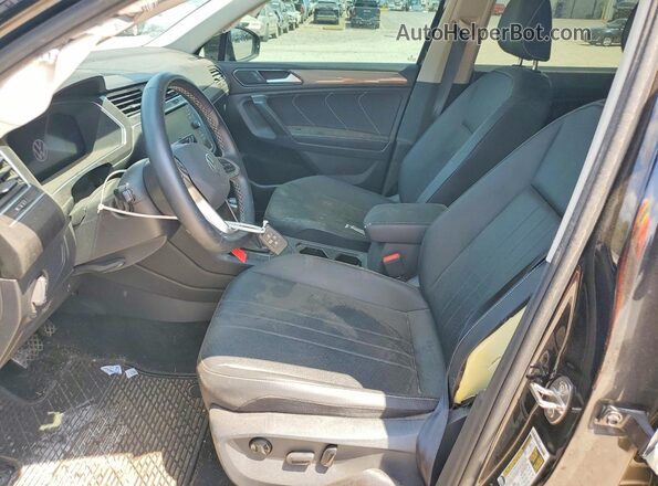 3VV3B7AX2PM068028 2023 VOLKSWAGEN TIGUAN Blue Front interior view