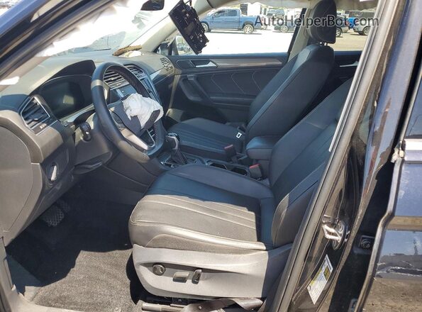3VV3B7AX2PM115963 2023 VOLKSWAGEN TIGUAN Black წინა სალონის ხედი