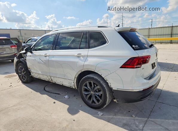 3VV3B7AX3PM118452 2023 VOLKSWAGEN TIGUAN White Trasero izquierdo