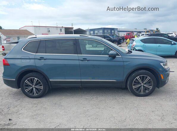 3VV3B7AX4KM079749 2019 VOLKSWAGEN TIGUAN Teal Widok wnętrza z tyłu